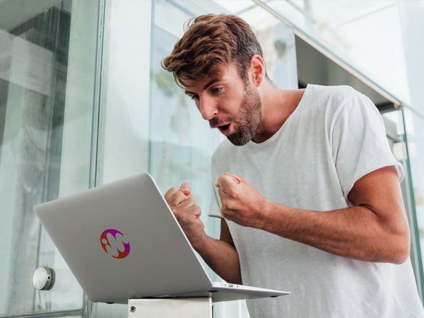 Man at laptop, happiness, success, work