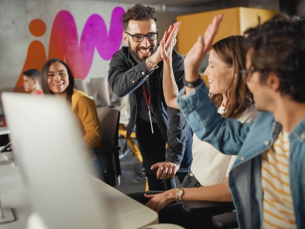 High five with colleagues